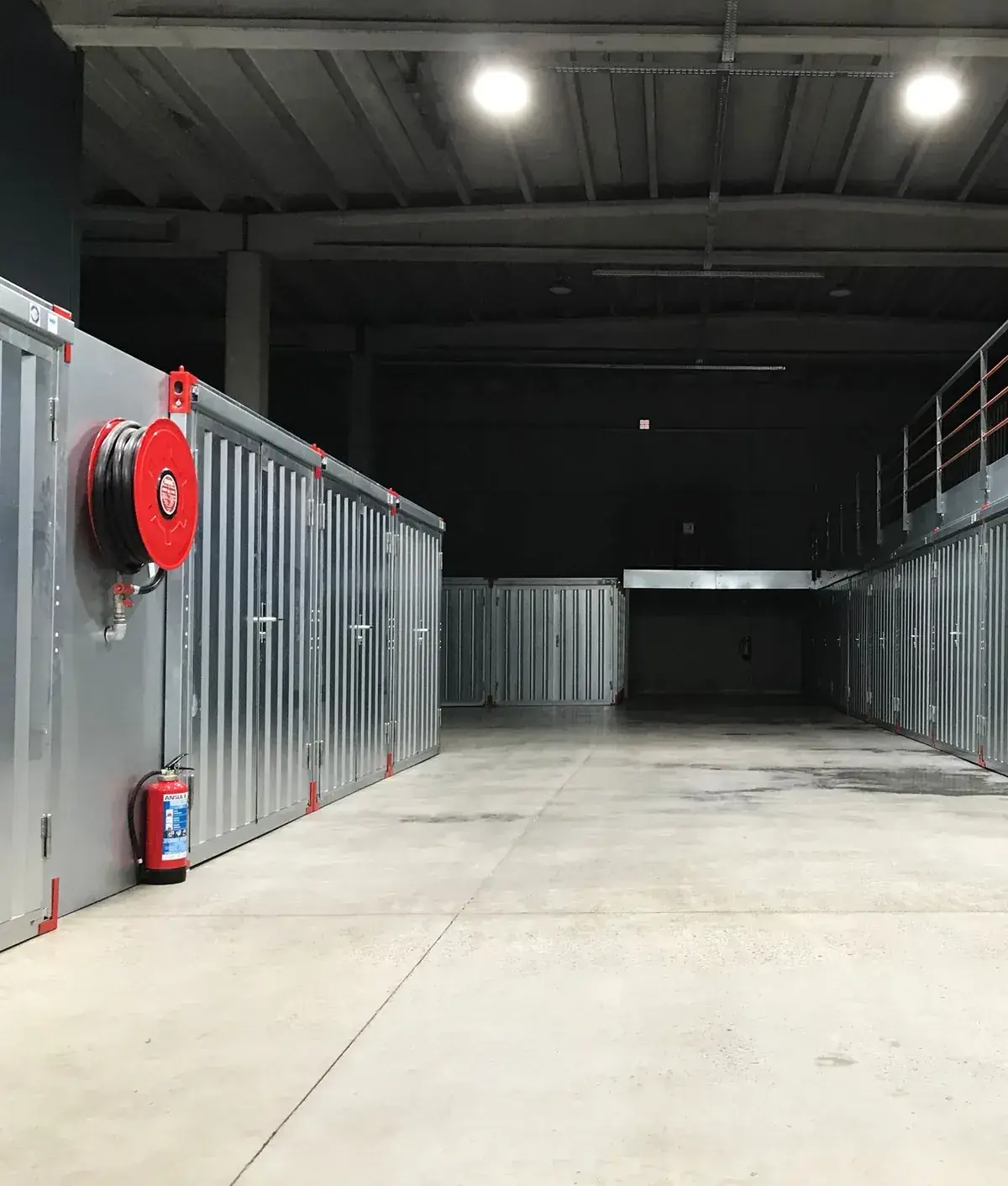 Stock bay with a hose reel and fire extinguisher